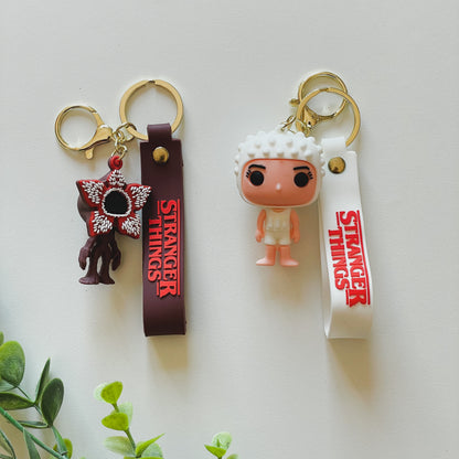 Portachiavi stranger things, in particolare undici e demogorgone